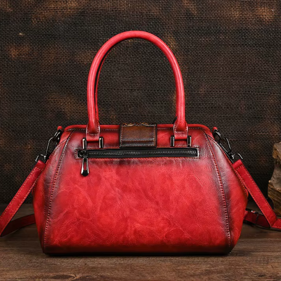 Florina | Borsa a mano in pelle con incisione e motivo floreale