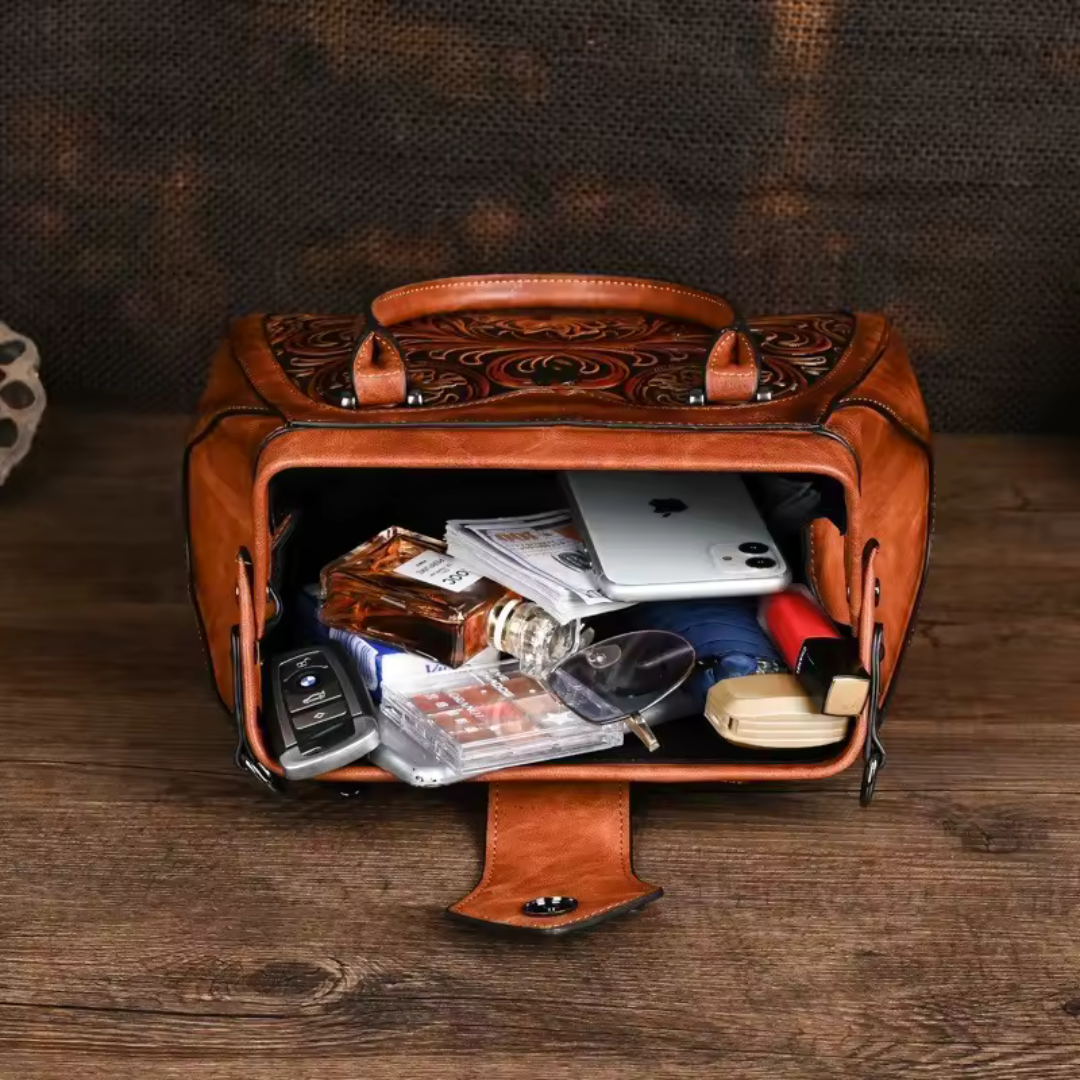 Florina | Borsa a mano in pelle con incisione e motivo floreale